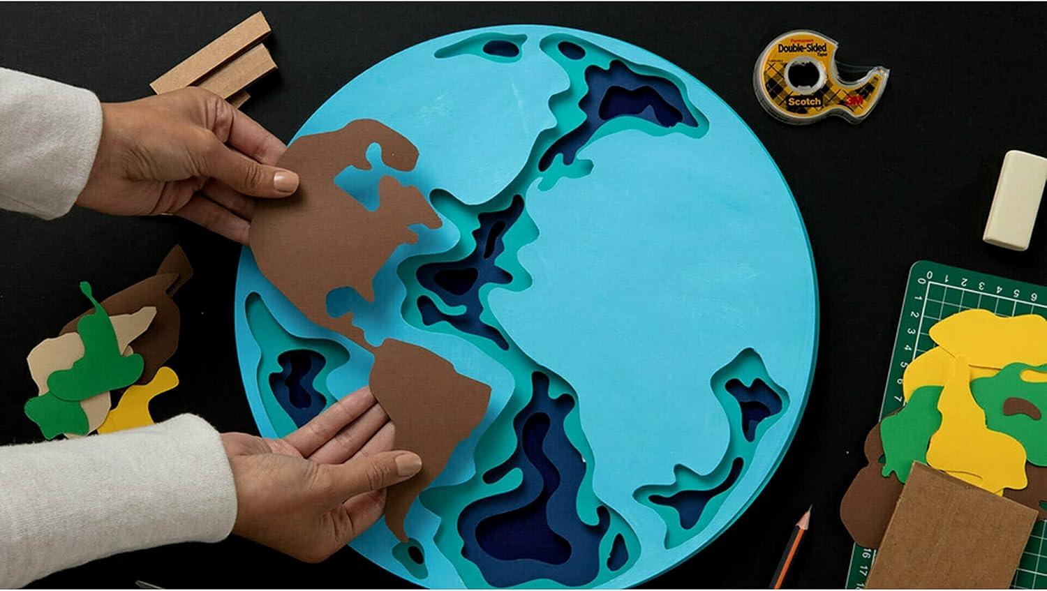 imageScotch Double Sided Tape with Deluxe Desktop Tape Dispenser 12 in x 900 in 1 Dispenser and 6 Refill RollsPack 6656PKC4012 x 900 in Pack of 12