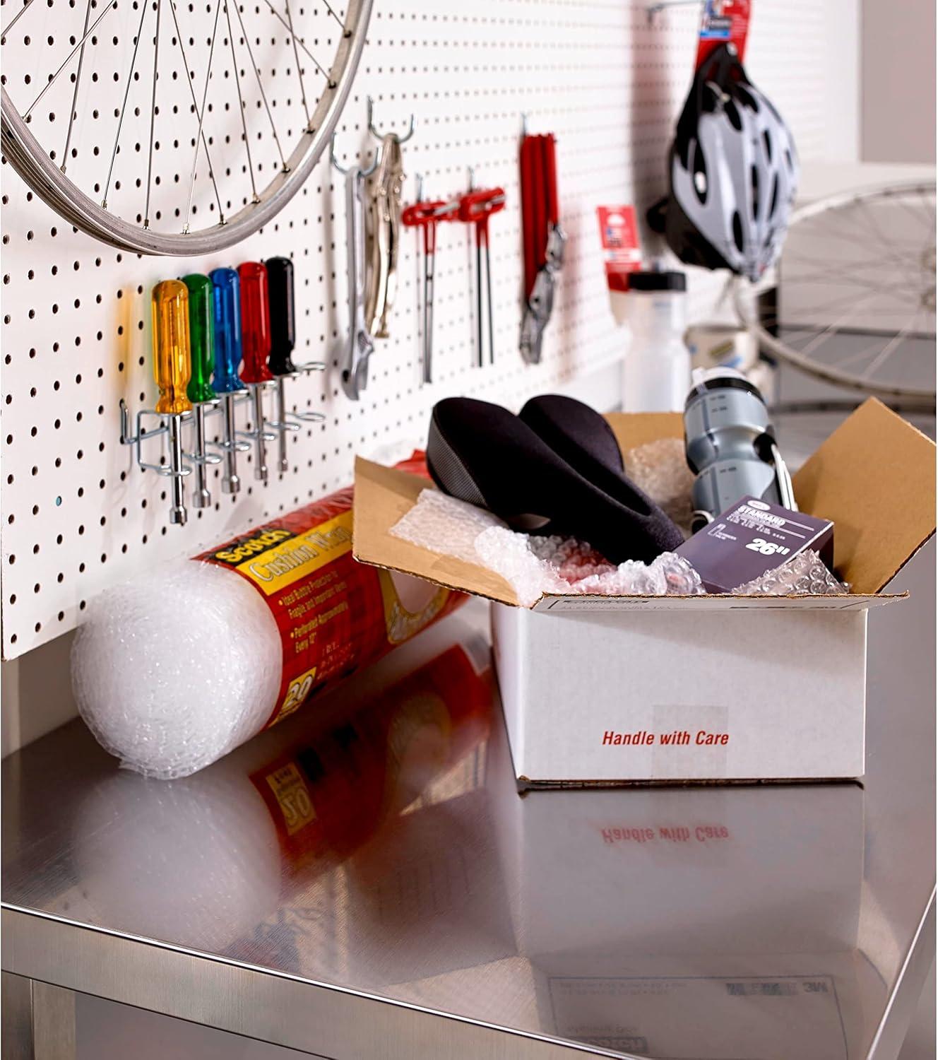 imageScotch Tough Grip Moving Packing Tape Clear Moving Tape That Secures Boxes up to 80 Pounds 188 in x 382 yd 3 Tape Rolls3 Rolls